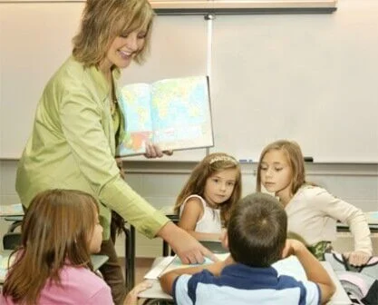 Writing Activities,fun writing | teacher in classroom | 10 Fun Classroom Writing Games to Improve Literacy Skills | literacyideas.com